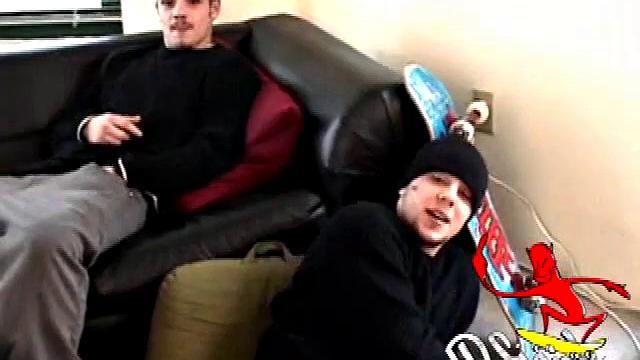 With skateboards propped nearby, and a straight porn video playing, Bradley Shaw is on the floor stroking his fat cock and Ryan Shaw is on the sofa, pants down around his legs, getting a stiff one.