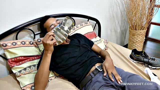 Joshua is a kinky Asian boy who gets off on male feet. He just got home from a long day at work, and nothing turns him on more than the sweet aroma of his Asian boy feet that have spent all day penned up in his shoes.