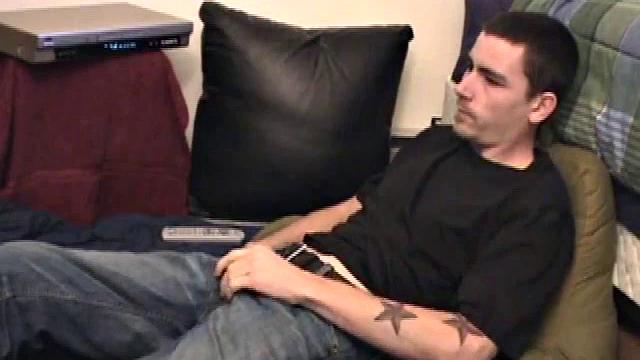 Dan Doe gets comfortable, works up a boner through his pants, gets naked, strokes his hard cock to the porn video, and shoots a high flying wad of warm cum onto his chest.