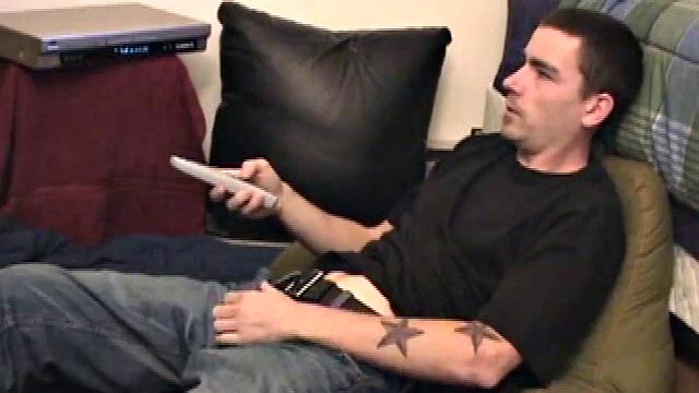 Dan Doe gets comfortable, works up a boner through his pants, gets naked, strokes his hard cock to the porn video, and shoots a high flying wad of warm cum onto his chest.