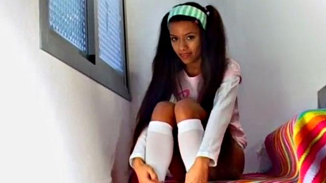 Watch this petite teen with small tits and a skinny frame finger her tight latina pussy solo