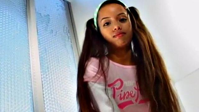 Watch this petite teen with small tits and a skinny frame finger her tight latina pussy solo