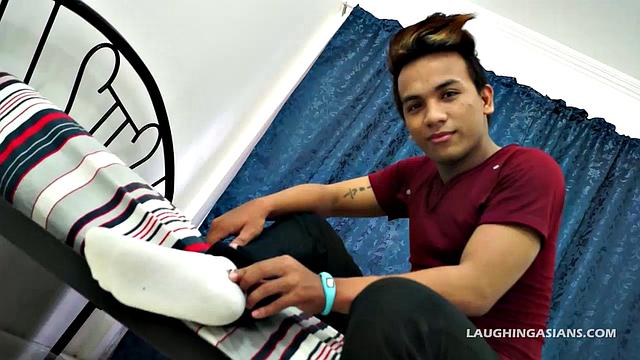 This hunky super cute Asian boy has some perfect Asian male feet. Derik is dark and handsome, so you're going to love this masculine Asian hunk as he slowly removes his shoes and socks up close to the camera for you.