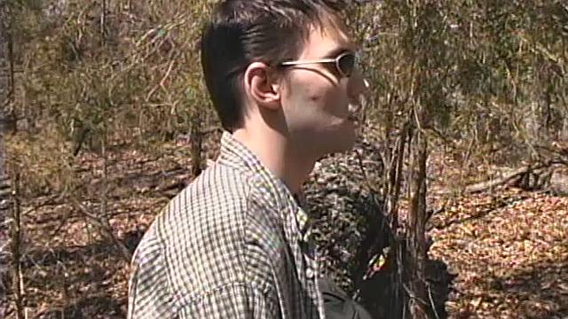 When 18 year old Derrick Windsor is out hiking in the woods, he gets the urge to jerk off. The young man looks around and sees he's alone, so he leans on a fallen tree and pulls down his pants just enough to work his growing cock.