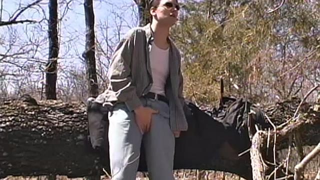 When 18 year old Derrick Windsor is out hiking in the woods, he gets the urge to jerk off. The young man looks around and sees he's alone, so he leans on a fallen tree and pulls down his pants just enough to work his growing cock.