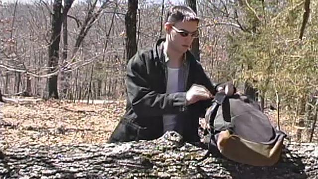 When 18 year old Derrick Windsor is out hiking in the woods, he gets the urge to jerk off. The young man looks around and sees he's alone, so he leans on a fallen tree and pulls down his pants just enough to work his growing cock.