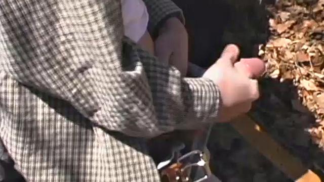 When 18 year old Derrick Windsor is out hiking in the woods, he gets the urge to jerk off. The young man looks around and sees he's alone, so he leans on a fallen tree and pulls down his pants just enough to work his growing cock.