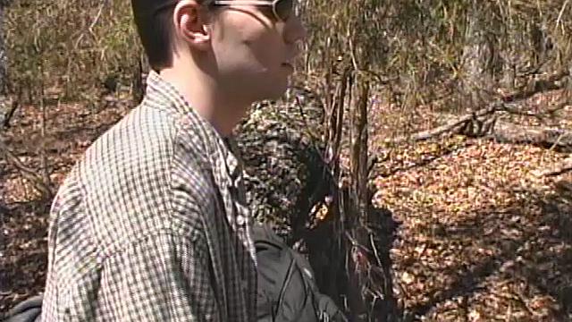 When 18 year old Derrick Windsor is out hiking in the woods, he gets the urge to jerk off. The young man looks around and sees he's alone, so he leans on a fallen tree and pulls down his pants just enough to work his growing cock.