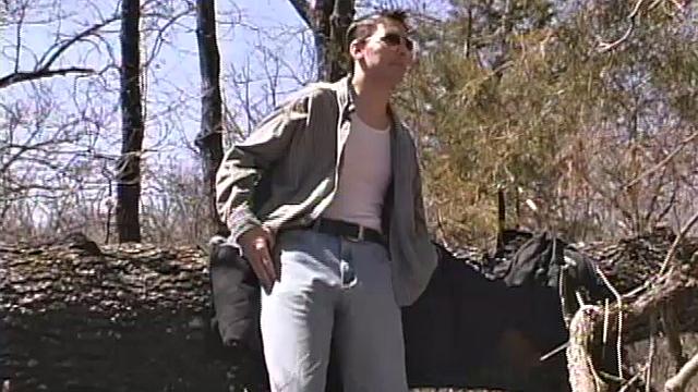 When 18 year old Derrick Windsor is out hiking in the woods, he gets the urge to jerk off. The young man looks around and sees he's alone, so he leans on a fallen tree and pulls down his pants just enough to work his growing cock.