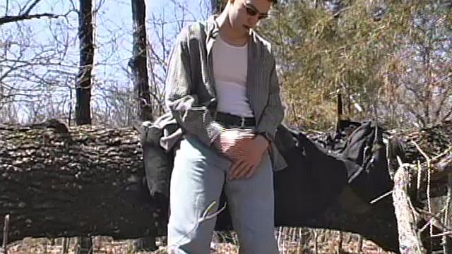 When 18 year old Derrick Windsor is out hiking in the woods, he gets the urge to jerk off. The young man looks around and sees he's alone, so he leans on a fallen tree and pulls down his pants just enough to work his growing cock.