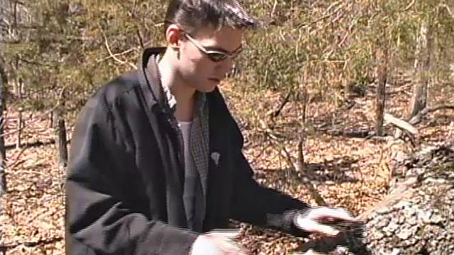 When 18 year old Derrick Windsor is out hiking in the woods, he gets the urge to jerk off. The young man looks around and sees he's alone, so he leans on a fallen tree and pulls down his pants just enough to work his growing cock.
