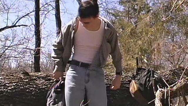 When 18 year old Derrick Windsor is out hiking in the woods, he gets the urge to jerk off. The young man looks around and sees he's alone, so he leans on a fallen tree and pulls down his pants just enough to work his growing cock.