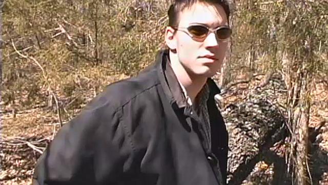 When 18 year old Derrick Windsor is out hiking in the woods, he gets the urge to jerk off. The young man looks around and sees he's alone, so he leans on a fallen tree and pulls down his pants just enough to work his growing cock.