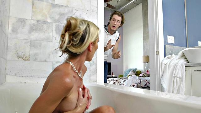 Blonde MILF gets wet and wild with a hot POV titjob and handjob in the bathtub