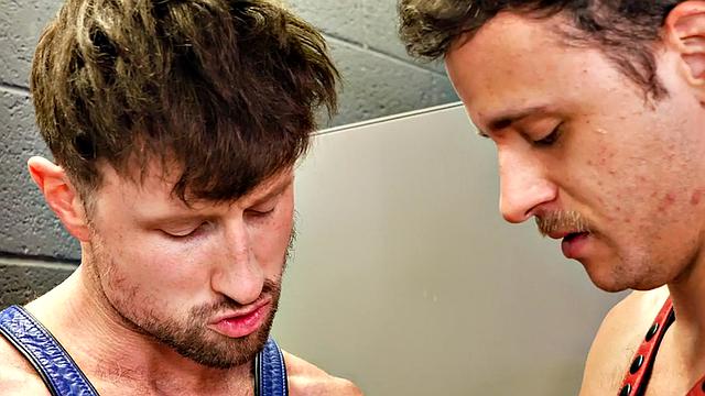 Fisting jock in leather f**ks BFs asshole in toilet