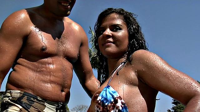 Curvy brunette gets her ass drilled in spooning poolside fun