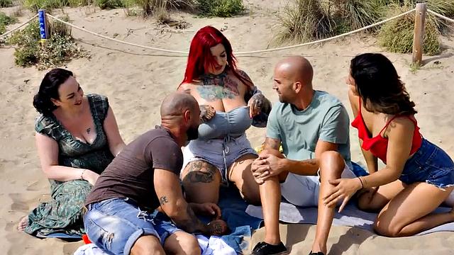 Busty redhead MILF with tattoos DP fucked outdoor in 3some