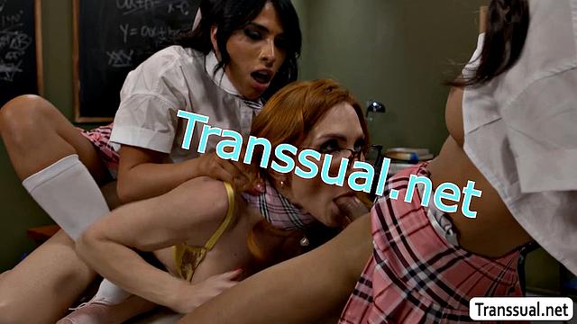 Two horny shemale students fuck redhead teacher