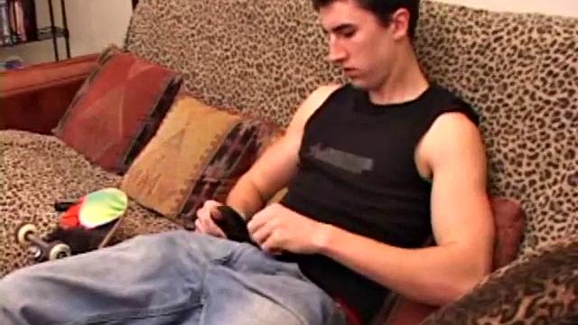 After returning from skateboarding JP pops in a porn video and begins stroking his cock. A little spit helps get it hard and he works his cock until he pumps out a nice load of warm cum onto his belly.
