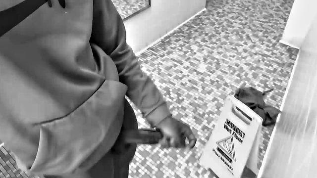 Filmed in black and white, Chris is in a public bathroom to show us his stuff. Already sporting a big boner, he drops to reveal a beautiful dick and fine ebony butt.