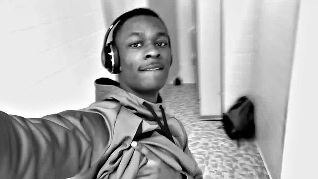 Filmed in black and white, Chris is in a public bathroom to show us his stuff. Already sporting a big boner, he drops to reveal a beautiful dick and fine ebony butt.