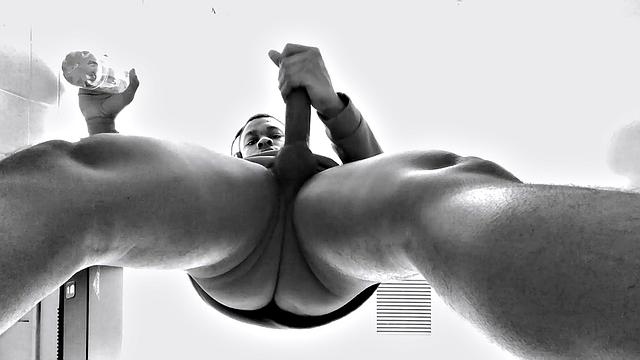 Filmed in black and white, Chris is in a public bathroom to show us his stuff. Already sporting a big boner, he drops to reveal a beautiful dick and fine ebony butt.