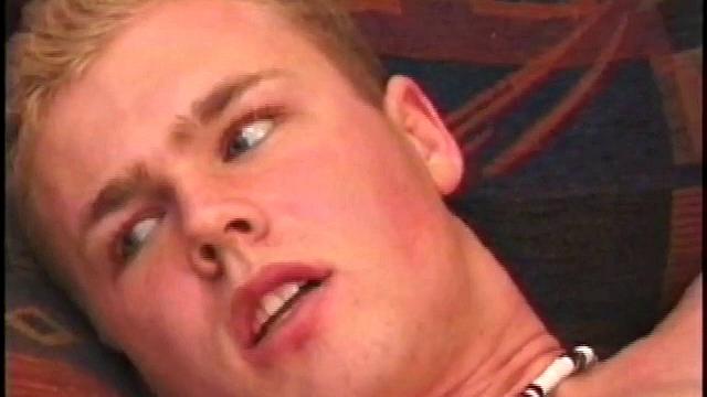 Relaxing on the couch, Brett Peters announces that he hasn't gotten off in a few days and that he really wants to blow a load on his face. That big floppy dick doesn't turn into a major stiffy until his fingers find his ass.