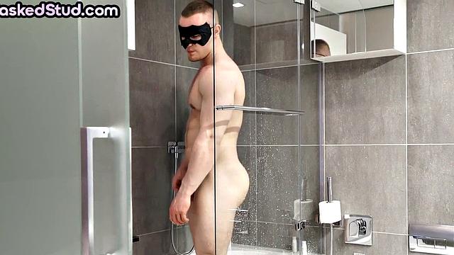 Masked solo jock wanks his hard rod before shower time