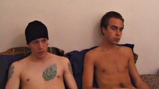 Shane and Vincenzo on the bed, with the goal to end up covering each other's faces in cum. They start watching a porn video and rub their stiff cocks through their pants. The clothes become too restraining and soon they come off.