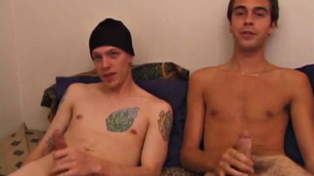 Shane and Vincenzo on the bed, with the goal to end up covering each other's faces in cum. They start watching a porn video and rub their stiff cocks through their pants. The clothes become too restraining and soon they come off.