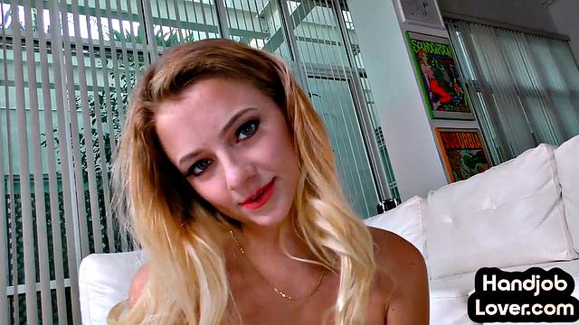 Blonde babe gives handjob to lover