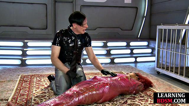 Wrapped babe dominated by master