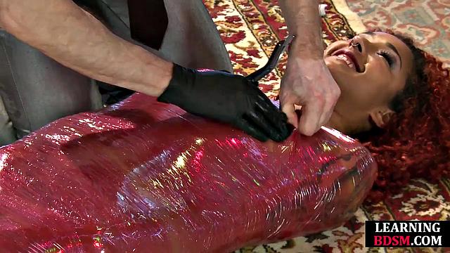 Wrapped babe dominated by master