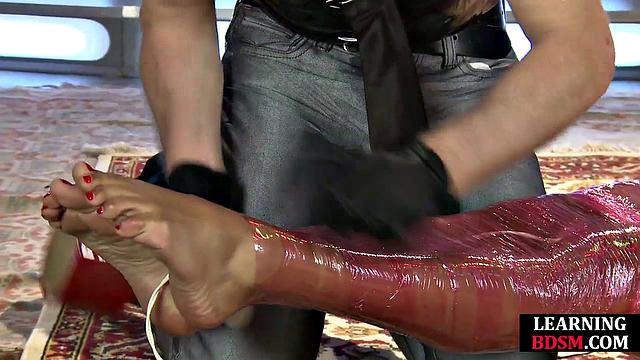 Wrapped babe dominated by master