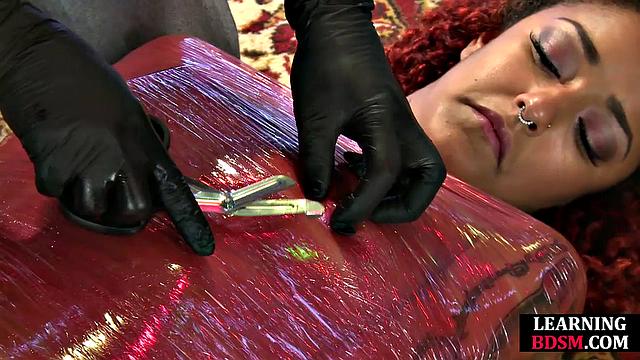 Wrapped babe dominated by master