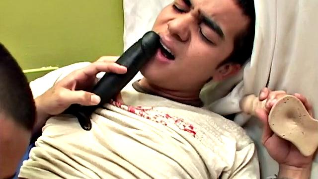 William has a thing for sex with dildos and he likes to teach other bottoms how they can enjoy without a top. He gets the boy's pants off and goes down on hom, before releasing his meat for Cristobal to suck on.