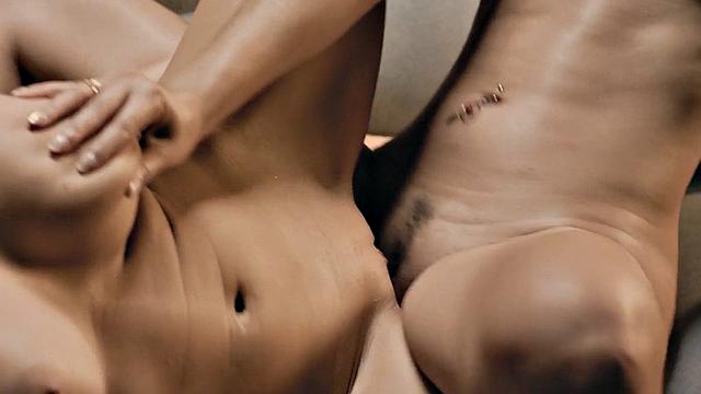 Busty lesbian scissoring and fingering in couple