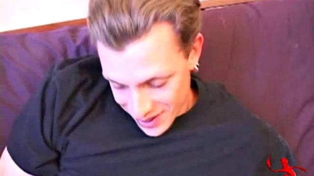 Shane is assisted by another hand in a jerk off scene.