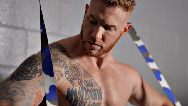 Eager tattooed muscled solo jock wanks and cums