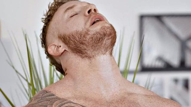 Eager tattooed muscled solo jock wanks and cums