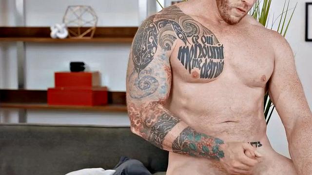 Eager tattooed muscled solo jock wanks and cums