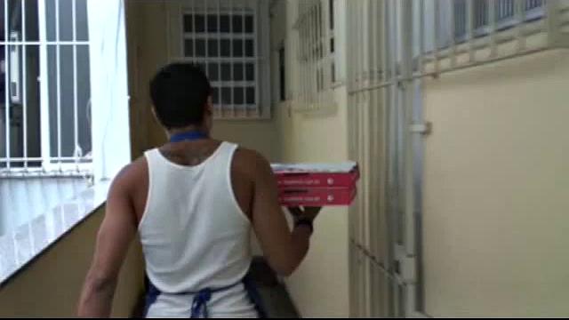 It has been a long hot day delivering pizza, and Martino has one more stop. Otavio Silva and Otavo Alves are at least dressed when Martion arrives. It's only a matter of time before they have their hands in their pants, though.