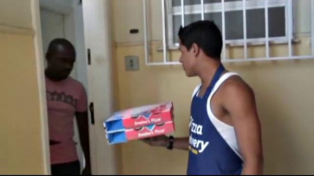 It has been a long hot day delivering pizza, and Martino has one more stop. Otavio Silva and Otavo Alves are at least dressed when Martion arrives. It's only a matter of time before they have their hands in their pants, though.
