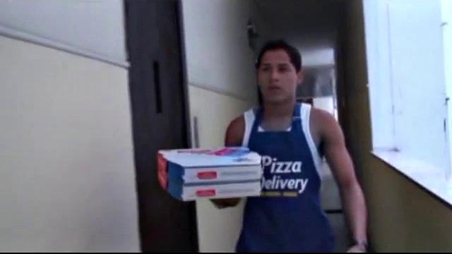 It has been a long hot day delivering pizza, and Martino has one more stop. Otavio Silva and Otavo Alves are at least dressed when Martion arrives. It's only a matter of time before they have their hands in their pants, though.