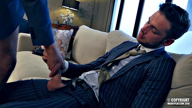 two suited men get soaked in the rain and fuck hard indoors