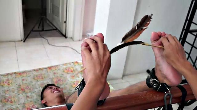 Cute Asian boy Lance returns in this foot tickling and tickle endurance combo. Lance's ankles are bound to the staircase banister. Warren tickles his feet.