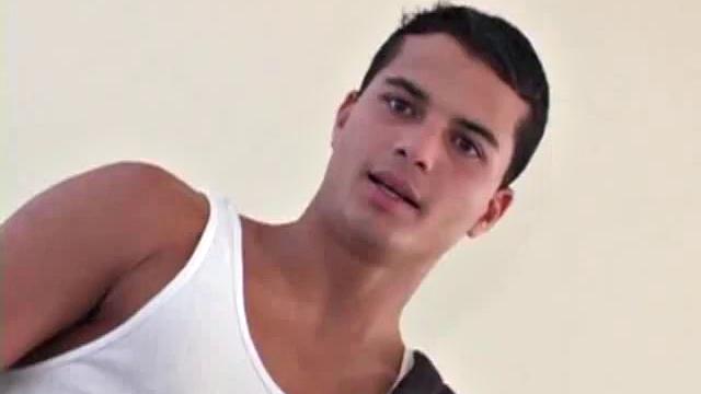 Stripped to see-through underwear, Darrien Leon waits for his Latin boyfriend Leon Paiva to arrive. Once Leon is home, they begin by licking each other's naked bodies.