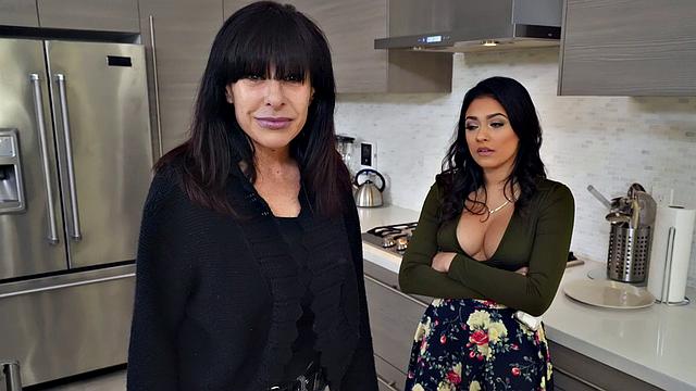 Horny brunette celebrates Mother's Day with a wild car ride & titjob in kitchen