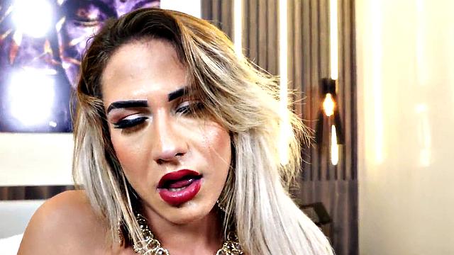 Watch this blonde bombshell tease and jerk off in lingerie & high heels