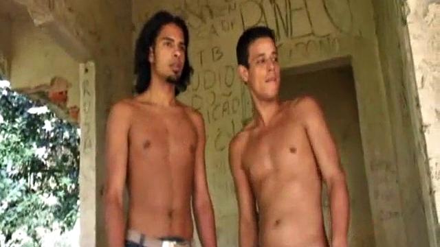 Brazilian buddies Antonio Pinto and Marco Santos walk through the jungle to the abandoned shack where they wait for hotties. Gomez Aguilar appears and puts on a dick slapping show.